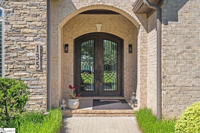 135 Neal Pointe Dr, Chesnee, SC 29323 - doorway to property featuring french doors and brick siding