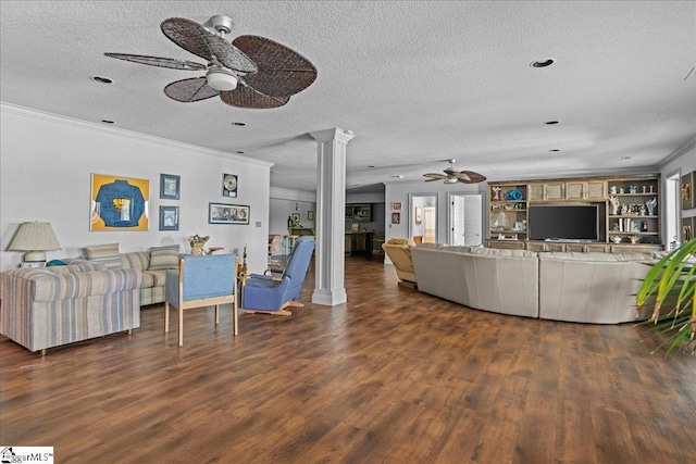135 Neal Pointe Dr, Chesnee, SC 29323 - living room with ceiling fan, decorative columns, a textured ceiling, crown molding, and dark wood-type flooring