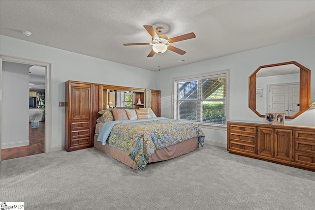 135 Neal Pointe Dr, Chesnee, SC 29323 - bedroom featuring carpet, baseboards, a ceiling fan, and a textured ceiling