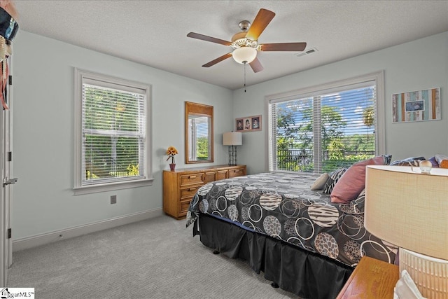 135 Neal Pointe Dr, Chesnee, SC 29323 - bedroom with light carpet, baseboards, and a ceiling fan