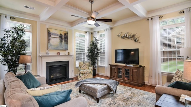 225 Highgrove Ct, Simpsonville, SC 29681 - living room with ceiling fan, wood finished floors, a fireplace with flush hearth, beamed ceiling, and baseboards