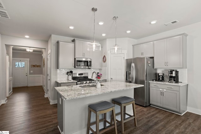 7 Grey Oak Trl, Greer, SC 29650 - kitchen with stainless steel appliances, a sink, dark wood-type flooring, tasteful backsplash, and recessed lighting