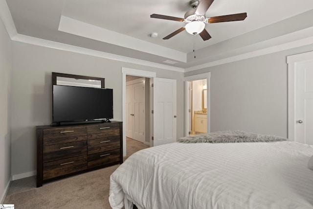 7 Grey Oak Trl, Greer, SC 29650 - bedroom with light colored carpet, a raised ceiling, baseboards, ensuite bath, and a ceiling fan