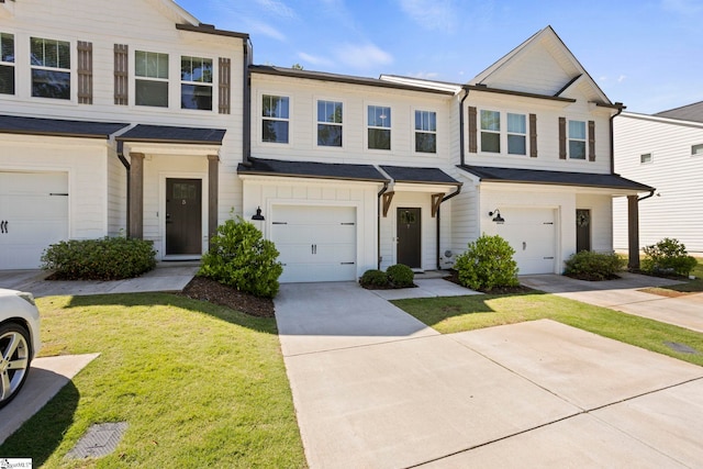7 Grey Oak Trl, Greer, SC 29650 - view of property with a front lawn, driveway, a garage, and board and batten siding