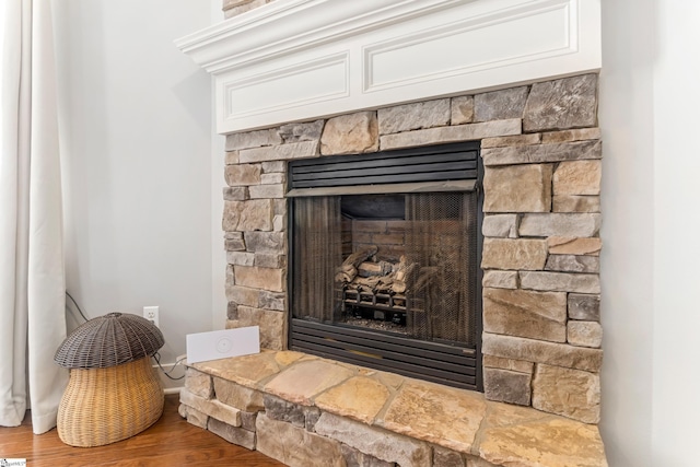 10 Croydon Way, Greenville, SC 29609 - detailed view of a fireplace, wood finished floors, and baseboards