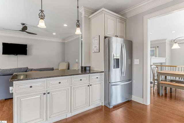 10 Croydon Way, Greenville, SC 29609 - kitchen with stainless steel fridge, wood finished floors, crown molding, open floor plan, and a peninsula