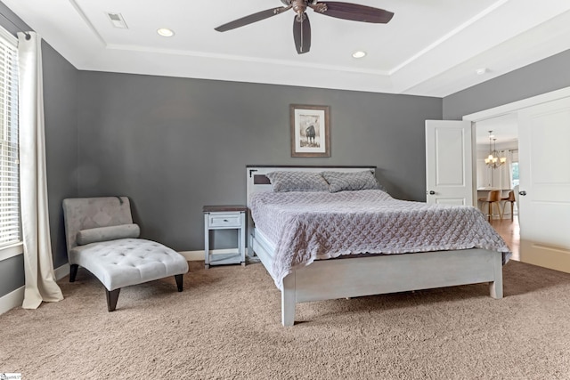 10 Croydon Way, Greenville, SC 29609 - carpeted bedroom featuring a tray ceiling, a chandelier, recessed lighting, a ceiling fan, and baseboards