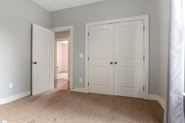 10 Croydon Way, Greenville, SC 29609 - unfurnished bedroom featuring carpet flooring, a closet, and baseboards