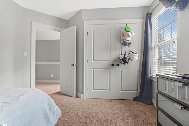 10 Croydon Way, Greenville, SC 29609 - carpeted bedroom featuring a closet and baseboards
