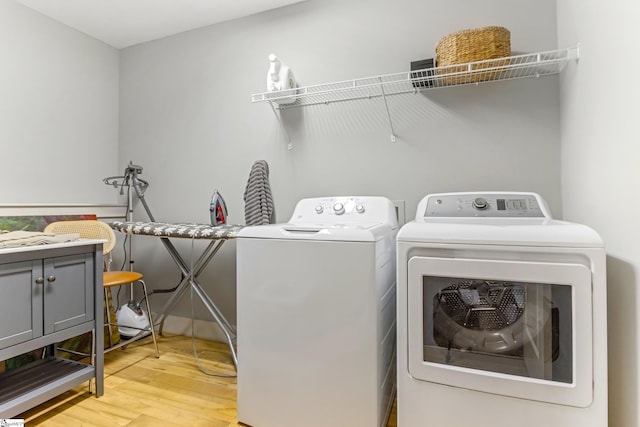 10 Croydon Way, Greenville, SC 29609 - laundry room featuring independent washer and dryer and light wood finished floors
