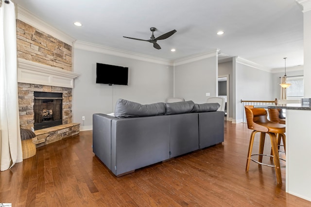 10 Croydon Way, Greenville, SC 29609 - living area featuring a ceiling fan, dark wood finished floors, ornamental molding, a fireplace, and baseboards