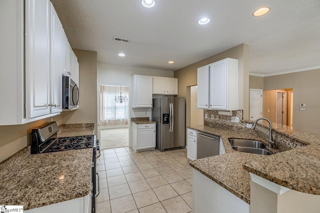 122 N Orchard Farms Ave, Simpsonville, SC 29681 - kitchen with appliances with stainless steel finishes, a sink, light stone countertops, white cabinetry, and recessed lighting
