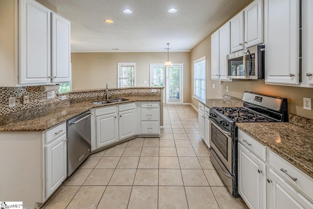 122 N Orchard Farms Ave, Simpsonville, SC 29681 - kitchen with appliances with stainless steel finishes, a sink, a peninsula, white cabinetry, and recessed lighting