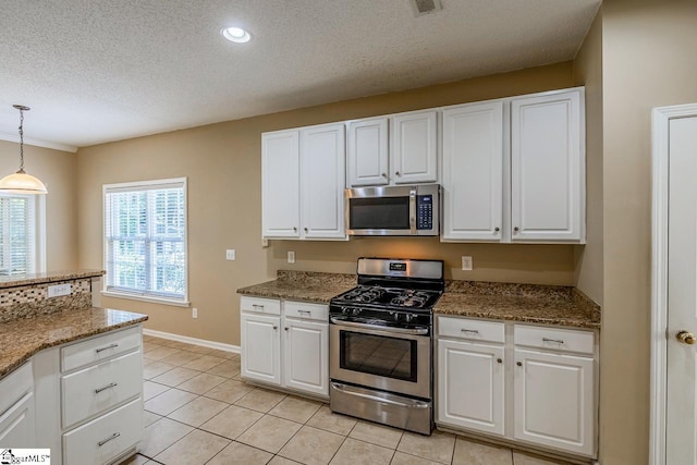 122 N Orchard Farms Ave, Simpsonville, SC 29681 - kitchen featuring appliances with stainless steel finishes, a textured ceiling, white cabinets, and recessed lighting