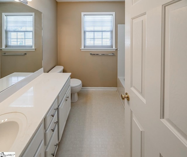 122 N Orchard Farms Ave, Simpsonville, SC 29681 - full bathroom with vanity, baseboards, toilet, a bath, and tile patterned flooring
