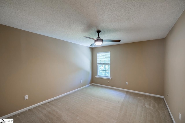 122 N Orchard Farms Ave, Simpsonville, SC 29681 - empty room featuring a ceiling fan, light colored carpet, baseboards, and a textured ceiling