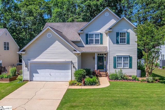 122 N Orchard Farms Ave, Simpsonville, SC 29681 - traditional home with an attached garage, driveway, a front lawn, and a shingled roof