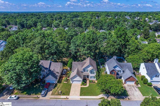 122 N Orchard Farms Ave, Simpsonville, SC 29681 - aerial perspective of suburban area featuring a heavily wooded area