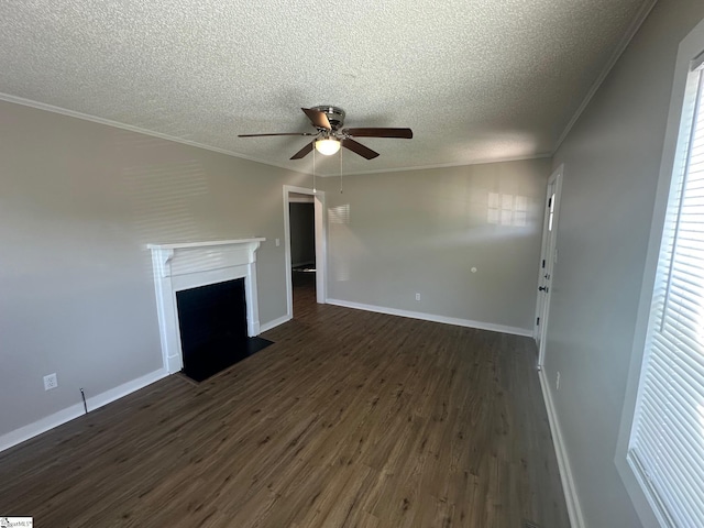 121 Pacolet Hwy, Gaffney, SC 29340 - unfurnished living room with ceiling fan, a textured ceiling, dark wood-style floors, ornamental molding, and a fireplace with flush hearth