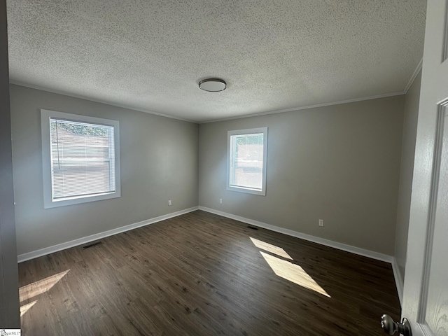 121 Pacolet Hwy, Gaffney, SC 29340 - spare room with dark wood-style flooring, crown molding, baseboards, and a textured ceiling