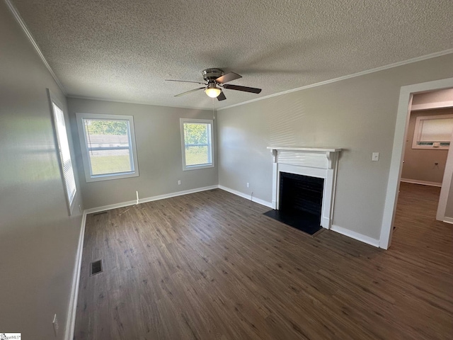 121 Pacolet Hwy, Gaffney, SC 29340 - unfurnished living room with crown molding, a textured ceiling, ceiling fan, dark wood-style flooring, and a fireplace with flush hearth