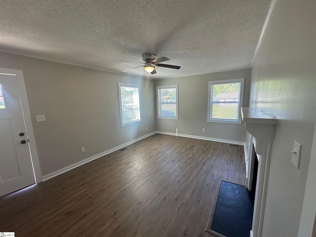 121 Pacolet Hwy, Gaffney, SC 29340 - unfurnished living room with dark wood-style flooring, crown molding, ceiling fan, a textured ceiling, and baseboards