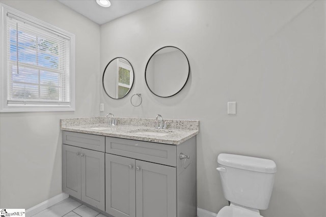 514 Habersham Ln, Easley, SC 29642 - bathroom with baseboards, double vanity, toilet, and tile patterned flooring