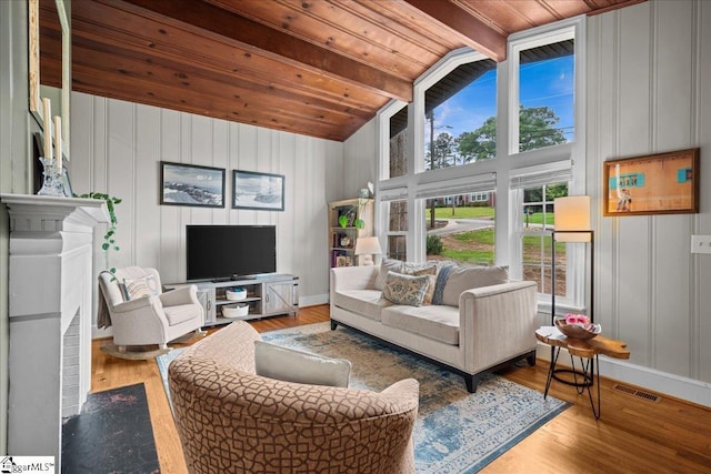 116 Twinbrook Dr, Greenville, SC 29607 - living area with wood ceiling with exposed beams, wood finished floors, baseboards, and high vaulted ceiling