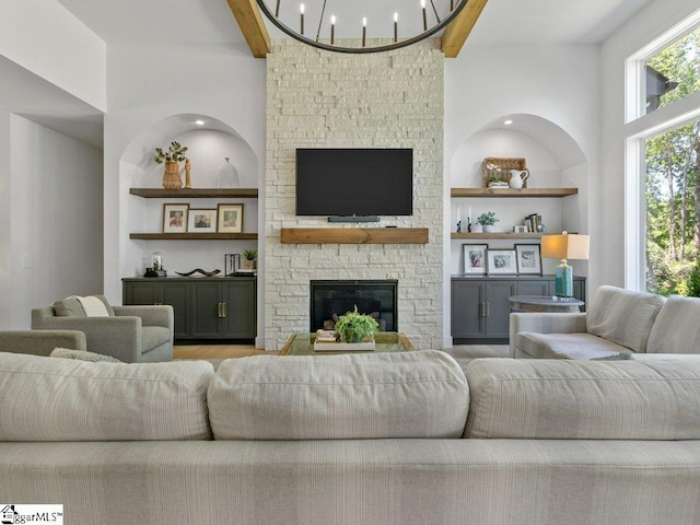 294 Lyman Lake Rd, Lyman, SC 29365 - living room with beam ceiling, wood finished floors, a fireplace, and built in features