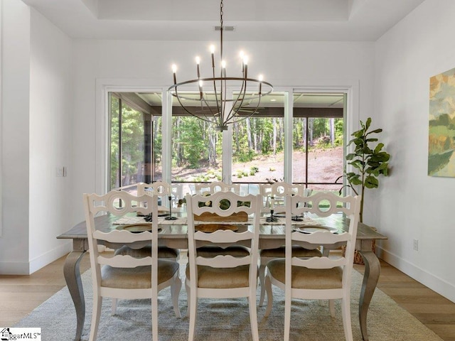 294 Lyman Lake Rd, Lyman, SC 29365 - dining space with a chandelier, light wood-type flooring, and baseboards
