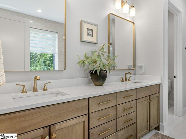 294 Lyman Lake Rd, Lyman, SC 29365 - full bathroom featuring double vanity and toilet