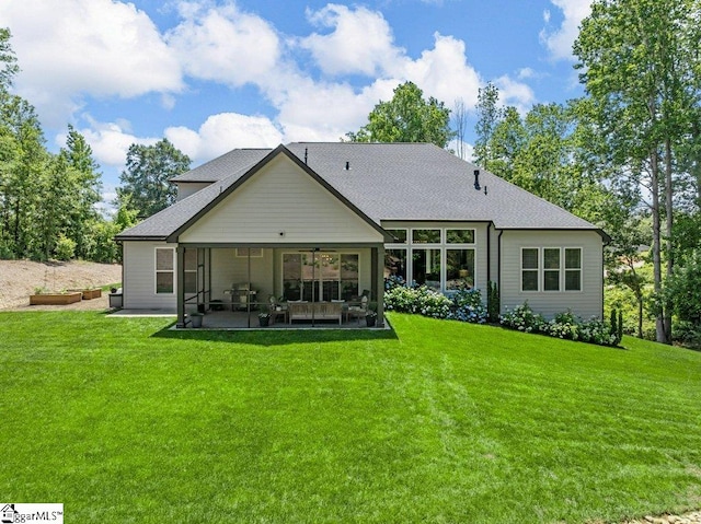 294 Lyman Lake Rd, Lyman, SC 29365 - rear view of property featuring a lawn, a sunroom, and ceiling fan