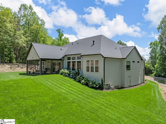 294 Lyman Lake Rd, Lyman, SC 29365 - back of property with a sunroom, a lawn, and roof with shingles