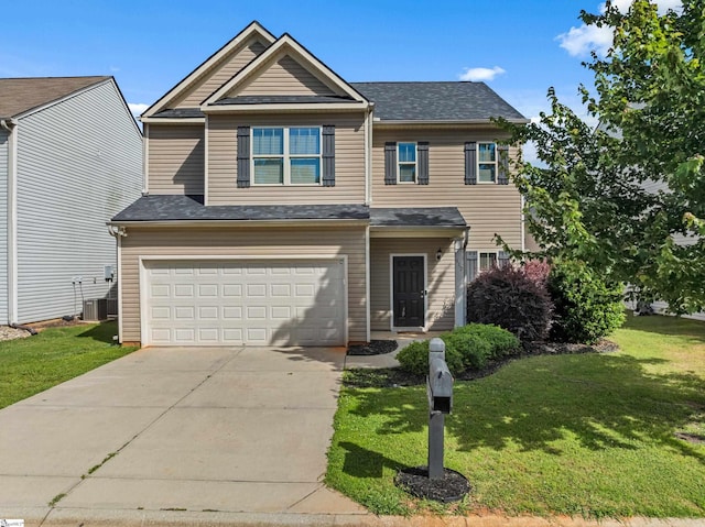 412 Kindletree Way, Simpsonville, SC 29680 - view of front of home with an attached garage, concrete driveway, a front lawn, and a shingled roof