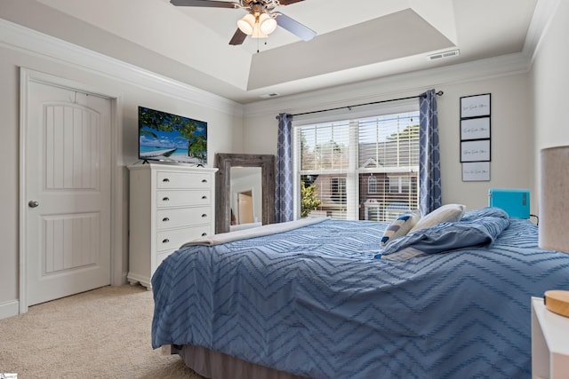 412 Kindletree Way, Simpsonville, SC 29680 - bedroom featuring a raised ceiling, light carpet, ornamental molding, and ceiling fan