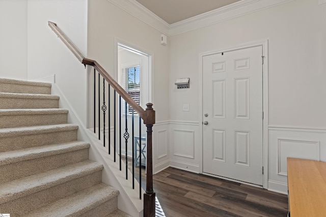 412 Kindletree Way, Simpsonville, SC 29680 - entrance foyer featuring dark wood-style floors, crown molding, stairway, a wainscoted wall, and a decorative wall