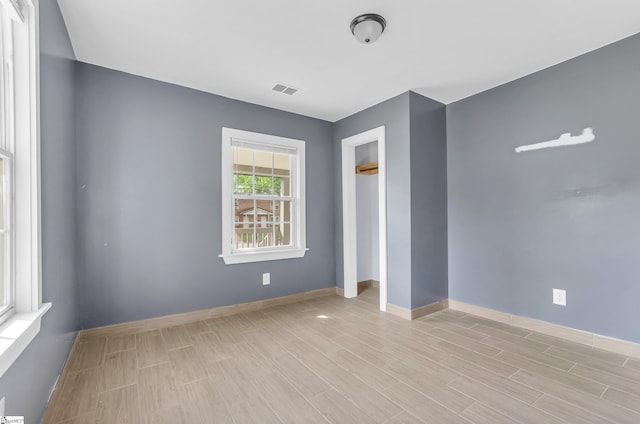 319 Hetty Hill St, Gaffney, SC 29340 - unfurnished bedroom featuring baseboards, wood finished floors, and a closet