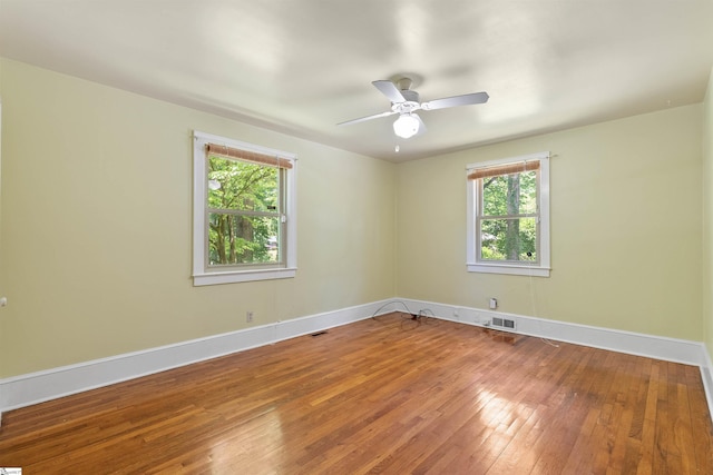 100 Maxwell Rd, Spartanburg, SC 29302 - spare room featuring hardwood / wood-style floors, baseboards, and ceiling fan