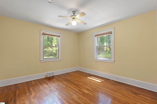 100 Maxwell Rd, Spartanburg, SC 29302 - spare room with plenty of natural light, wood finished floors, and baseboards