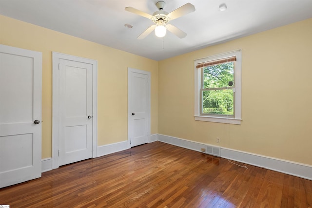 100 Maxwell Rd, Spartanburg, SC 29302 - unfurnished bedroom with hardwood / wood-style flooring, baseboards, and a ceiling fan