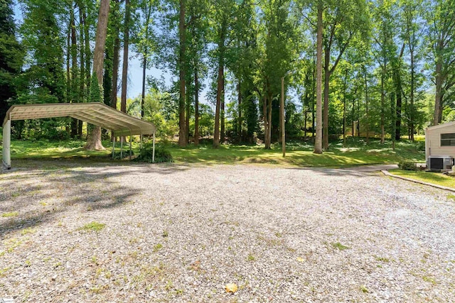 100 Maxwell Rd, Spartanburg, SC 29302 - view of yard featuring a carport, cooling unit, and gravel driveway