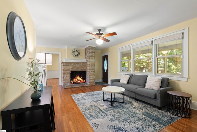 100 Maxwell Rd, Spartanburg, SC 29302 - living room featuring wood finished floors, ceiling fan, a brick fireplace, and baseboards