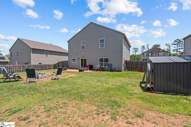559 Falls Cottage Run, Boiling Springs, SC 29316 - back of property with an outdoor fire pit