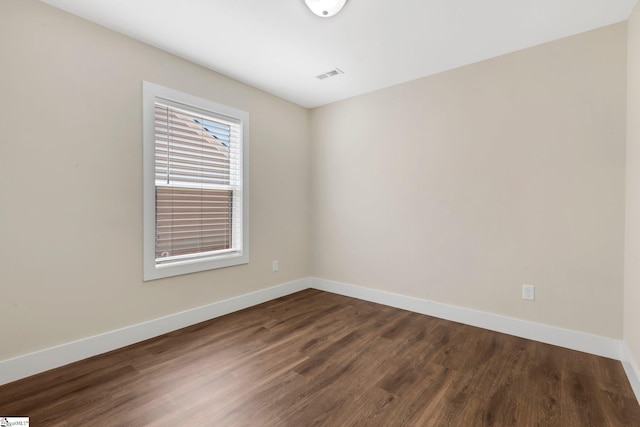 184 Sandifer Rd, Spartanburg, SC 29303 - spare room featuring baseboards and dark wood-style flooring