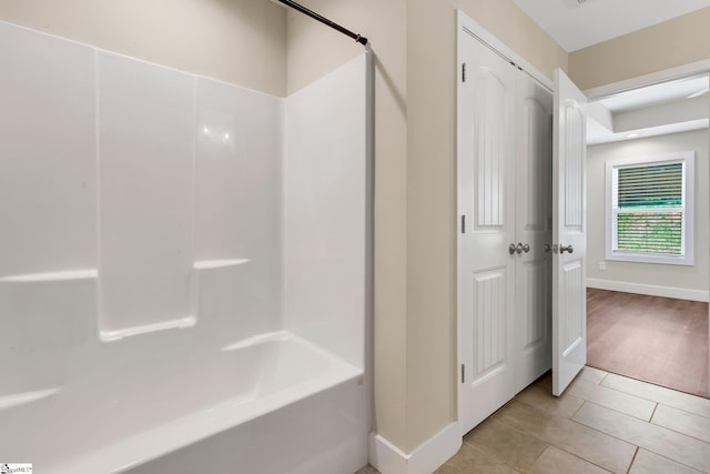 184 Sandifer Rd, Spartanburg, SC 29303 - bathroom featuring baseboards, bathtub / shower combination, and tile patterned floors