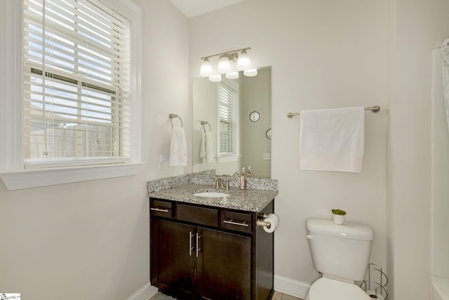 131 Riverland Woods Ct, Simpsonville, SC 29681 - bathroom featuring healthy amount of natural light, vanity, toilet, and baseboards