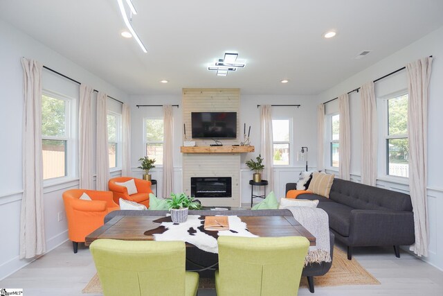 125 Patton St, Fountain Inn, SC 29644 - living area with light wood-style floors, a large fireplace, and recessed lighting