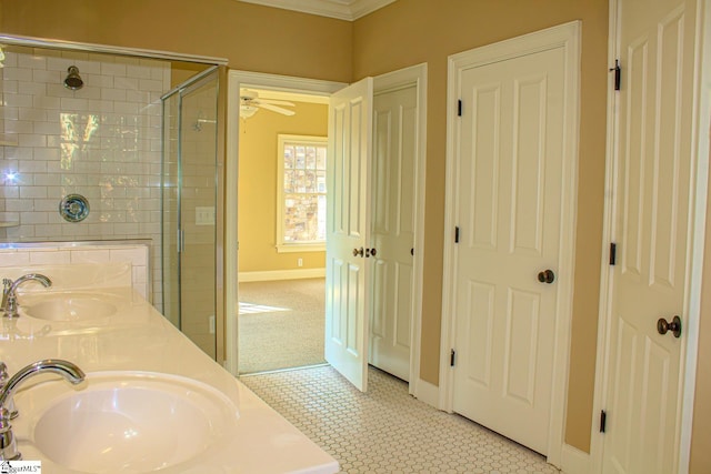 231 Austin Brook St, Simpsonville, SC 29680 - full bath with double vanity, a tile shower, ceiling fan, crown molding, and baseboards
