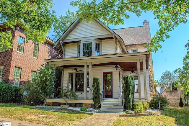 231 Austin Brook St, Simpsonville, SC 29680 - victorian home with ceiling fan, a chimney, a porch, and a front yard