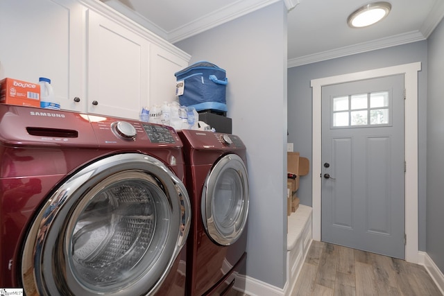 1122 Midway Rd, Pickens, SC 29671 - washroom with washing machine and dryer, cabinet space, light wood-style floors, crown molding, and baseboards